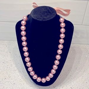 Unique vintage Faux pearl pink  necklace with pink tye bow in the back